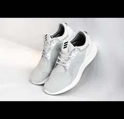 Gray sneakers with dense surface